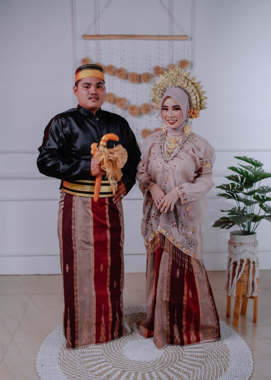Erwandi & Yusrianti